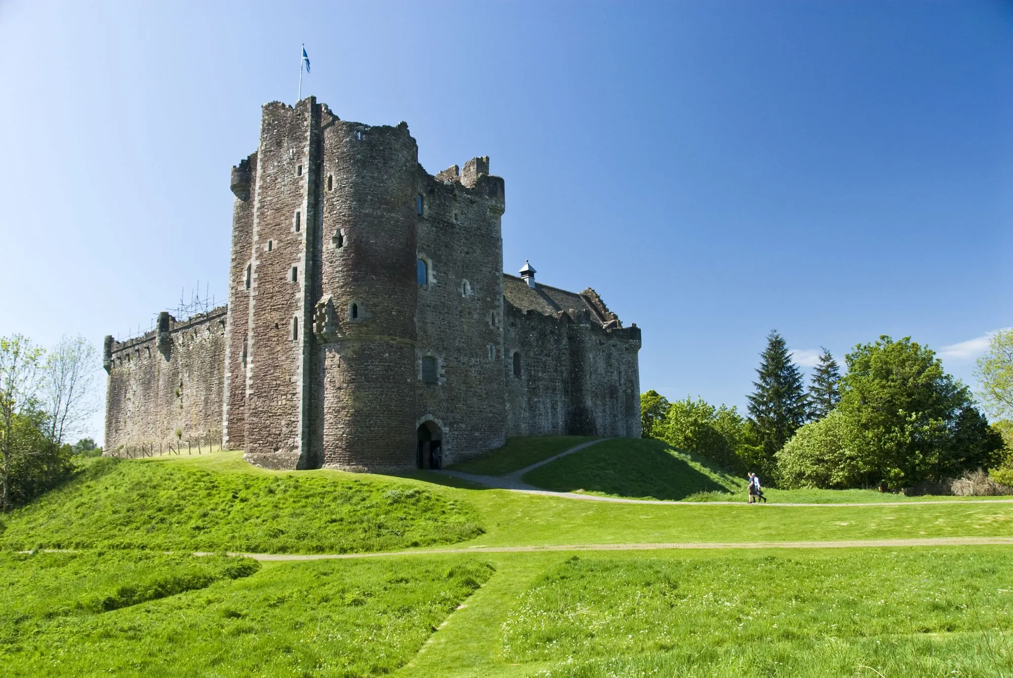 Doune Castle, Castle Leoch in Outlander, under a blue sky